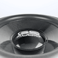 Nahaufnahme eines schwarzen GS Audio Gold 10000 MK2 21″-Lautsprechers mit Carbon-Optik und Logo auf der Staubschutzkappe, vor einem schlichten weißen Hintergrund.