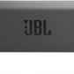 Ein rechteckiger schwarzer JBL STAGE GT 50011-Verstärker verfügt über das JBL-Logo auf der Oberseite, Anschlussklemmen auf der linken Seite und einen metallischen Subwoofer-Anschluss auf der rechten Seite.