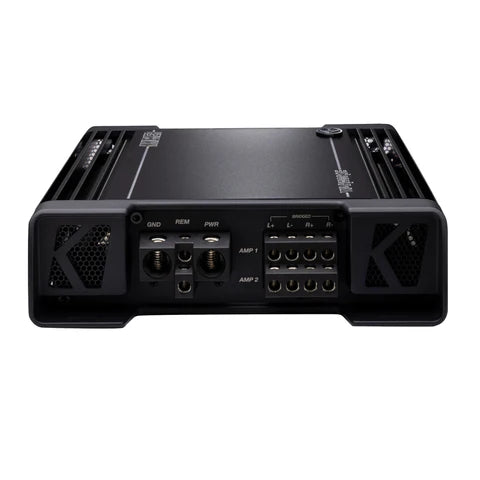 Un amplificador de audio para coche de 4 canales Kicker Warhorse Series 49WXA10004 negro, vista posterior, con una potencia RMS de 450 W y terminales de cable de altavoz etiquetados para múltiples conexiones.