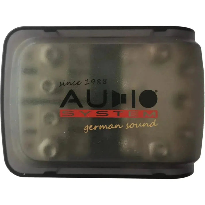 The Audio System Z-FDB 3-4 is a black and transparent rectangular device with Mini-ANL Sicherungen, internal components, and german sound since 1988 labeling.