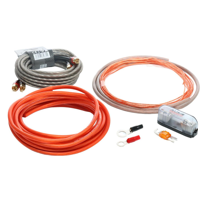 Audio System Z-PCSC 10 bis 600W kit: three coiled cables gray, clear, red, 10mm² OFC copper wire, fuse holder with fuse, and two ring terminals for up to 600W amps.