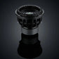 The Deaf Bonce Apocalypse DВ-3.5K 12 subwoofer features a ribbed cone and metal frame, shown against a dark reflective surface with a gradient background.