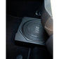 El Edge Car Audio EDBX10A-E0 es un subwoofer negro ultraplano de 10 que se instala debajo de un asiento de coche, con la moqueta y parte del asiento a la vista.