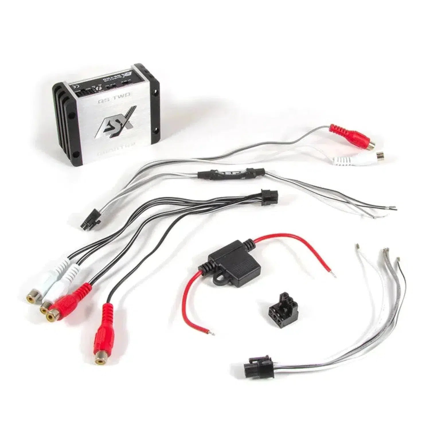 Assorted car stereo wiring harnesses, connectors, and an ESX Quantum QS-TWO Nano Digital Technologie Class D 2-Kanal Verstärker on a white background.
