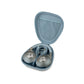 A pair of Focal Azurys headphones with HiFi sound quality placed in an open light blue carrying case featuring a mesh pocket on the lid.