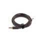 Een opgerolde bruine 3,5 mm audiokabel met vergulde connectoren en zwart klittenband, perfect voor Focal Hadenys of andere open HiFi-hoofdtelefoons.