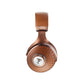 Auriculares Focal Stellia en cobre, mostrados desde el lateral con un patrón circular texturizado y el logotipo de Focal en el auricular con transductores de berilio.