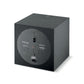A Focal Sub 600 P black subwoofer is angled to show its rear panel, featuring audio inputs, controls, and a closed-box design.