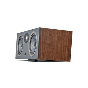 Theva Center by Focal features a wood grain finish and dual round speakers, ideal as a center speaker for home theater, shown on a white background.