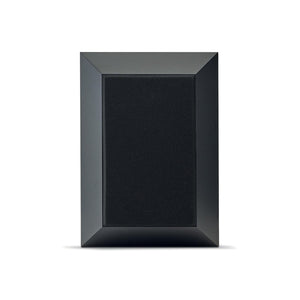 A black, rectangular Focal Theva Surround speaker with beveled edges is photographed against a plain white background.