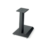 The Focal Theva Vestia Center Stativ is a black metal stand with a square top plate, tapered support, and a wide base with four adjustable feet.