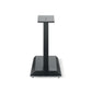 The Focal Theva Vestia N°1 Stativ is a black metal speaker stand with a rectangular top plate, single central support, and wide base with adjustable feet, shown on a white background.