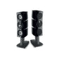 Due diffusori Focal Viva Utopia Colour Evo, rifiniti in un elegante nero con superfici curve e basi robuste, ciascuno dotato di tre driver principali, su sfondo bianco.
