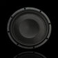 Vista frontale: il Gladen GS10-Slim, un subwoofer rotondo da 10 pollici di colore nero con griglia esagonale, offre un suono potente su uno sfondo completamente nero.