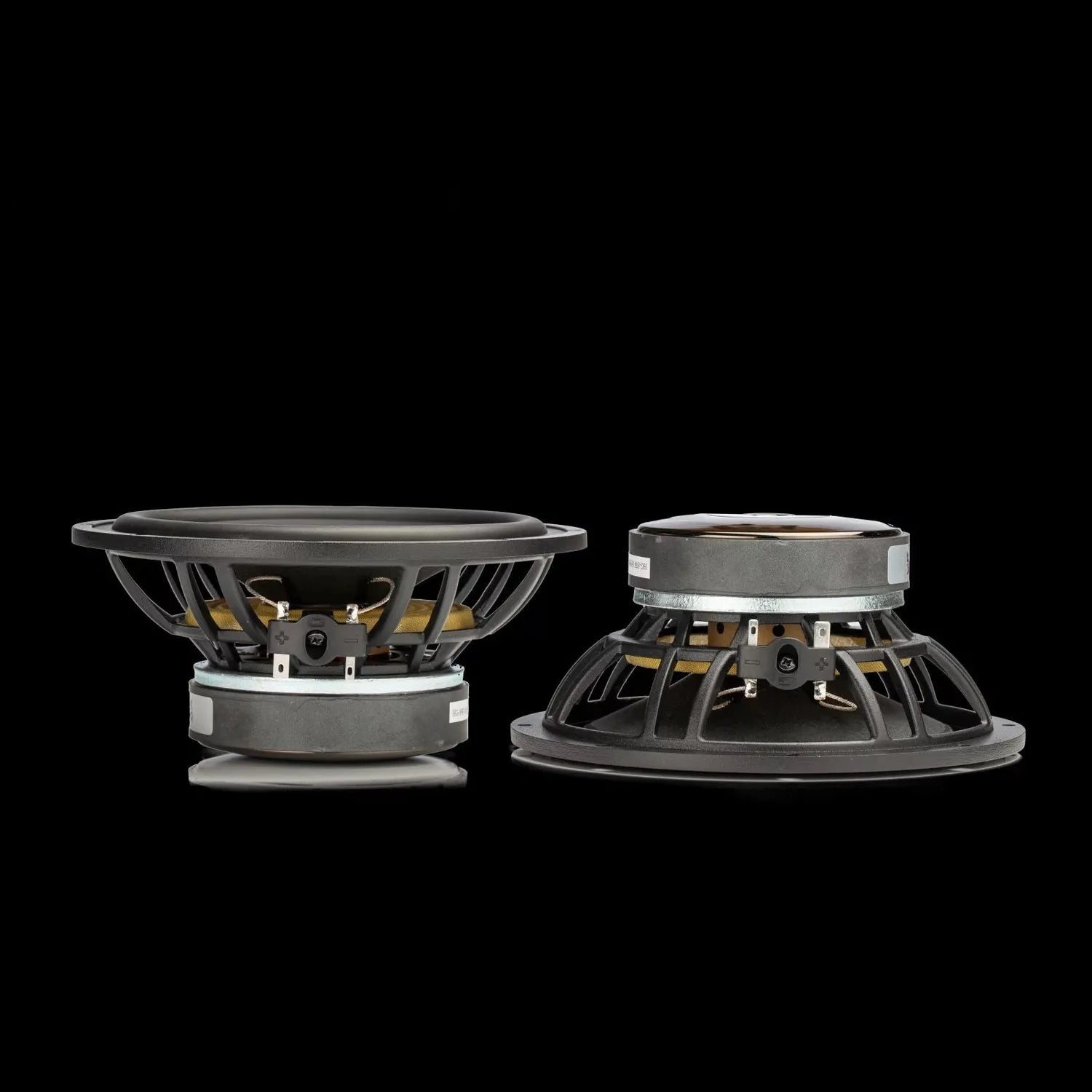 Two large Gladen SIGMA 165.2 AC car audio subwoofers, one upright and one sideways, both with exposed black and silver frames against a solid black background.
