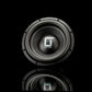 Un subwoofer Gladen Sigma SSW10 di colore nero, di forma circolare, con il logo G argentato e la scritta Gladen su sfondo nero; sotto si nota un leggero riflesso.
