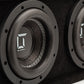 Primer plano de dos subwoofers Gladen Sigma SSWX065 Dual de color negro, en el que se aprecian los conos texturizados y las finas costuras de los bordes.