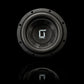 El subwoofer Gladen Sigma SSWX08 destaca sobre un fondo negro con su reflejo en la parte inferior: una opción llamativa para un sistema de audio para coche de alta gama.