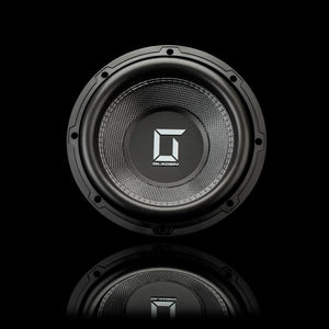 Le caisson de basses Gladen Sigma SSWX10 noir arbore un logo « G » argenté, représenté sur un fond noir avec son reflet. Idéal pour les systèmes audio embarqués haut de gamme.