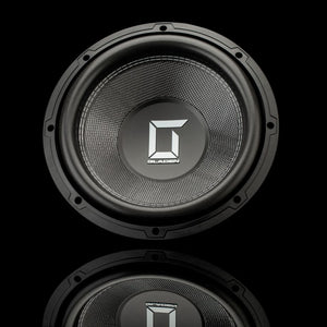 Subwoofer Gladen Sigma SSWx12 de 12 pouces, noir avec logo argenté, photographié sur fond noir avec des reflets. Offre des basses profondes et très performantes.