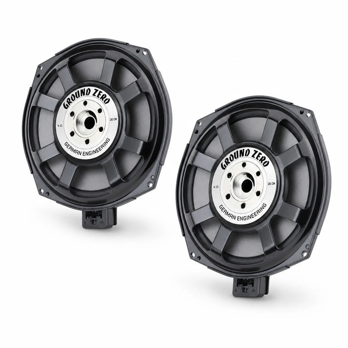 Se muestran dos subwoofers para coche Ground Zero GZCS 200BMW-SW4 negros con etiquetas centrales plateadas Ground Zero German Engineering sobre fondo blanco.
