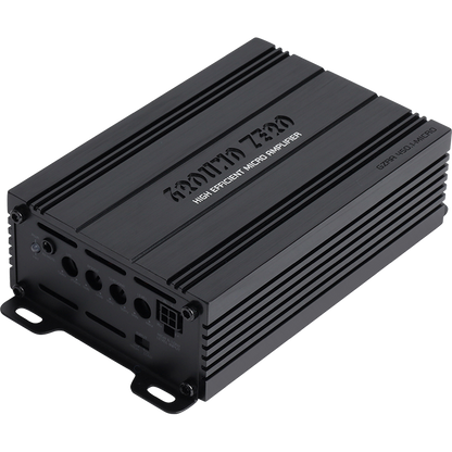 El Ground Zero Radioactive GZRA 450.1-MICRO, un amplificador mono de clase D de metal negro con puertos de entrada/salida y soportes de montaje, lleva la etiqueta HIGH EFFICIENT MICRO AMPLIFIER.
