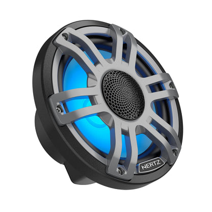 Le Hertz HMX 7.7 S-LD-G.2 est un haut-parleur coaxial rond, de couleur noire et argentée, doté dun anneau LED bleu, dune grille métallique et du logo HERTZ en bas.