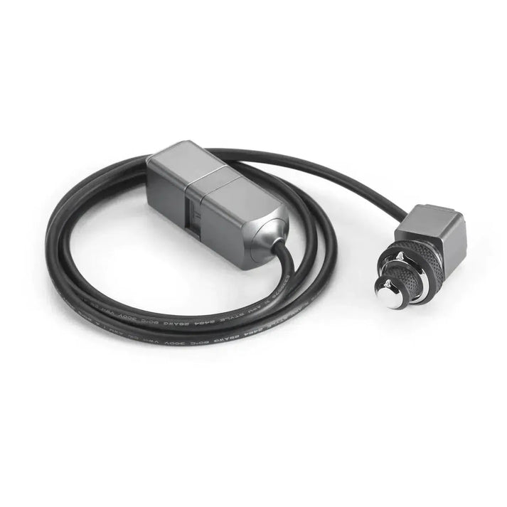 The JL Audio DRC-205 is a coiled black cable with a rectangular adapter on one end and a metal automotive cigarette lighter plug on the other.