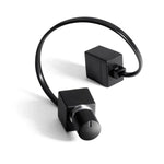 The JL Audio RBC-1 is a black bass control knob with cable and box, both square-shaped, shown on a white background.