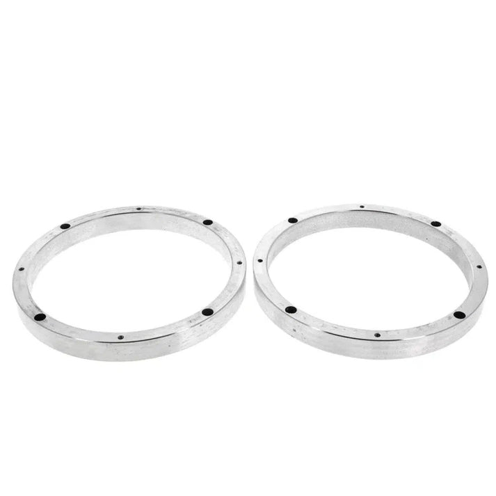 Twee zilveren Masori Aluring 165-17 Universal für 6,5 Zoll ringen met gelijkmatig verdeelde kleine zwarte gaatjes zijn naast elkaar geplaatst op een witte achtergrond.