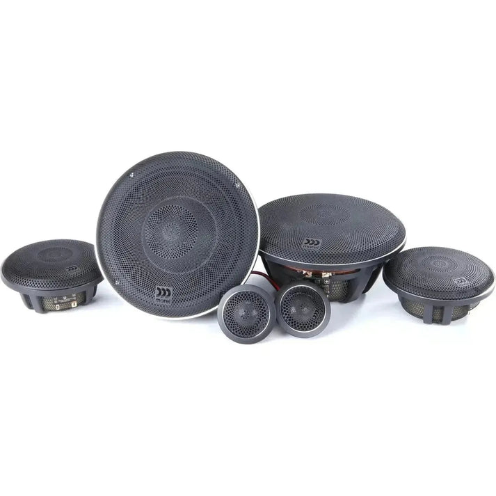 Five black car audio speakers, including Morel Elate Carbon 63 woofers, form a 3-way speaker set arranged on a white surface.