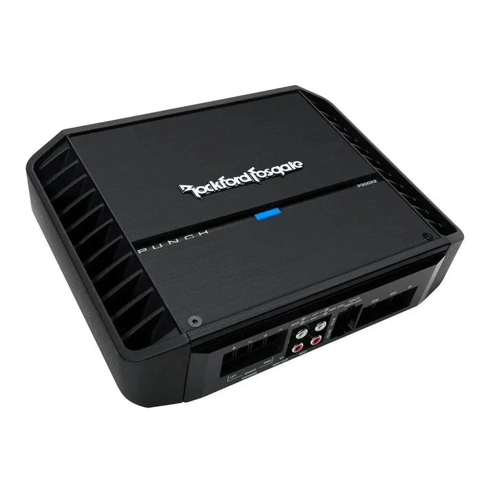A black Rockford Fosgate Punch P300X2 car amplifier features a blue LED indicator and several input/output ports on one side.