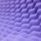Primo piano della schiuma viola STP Biplast Wave 15, che mostra il suo motivo ondulato, pensato per lassorbimento acustico o lammortizzazione.