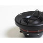 Primer plano del altavoz negro Vibe Audio CVEN1SQT-V9 con rejilla metálica y Kalotten-Hochtöner, parcialmente visible sobre fondo blanco.