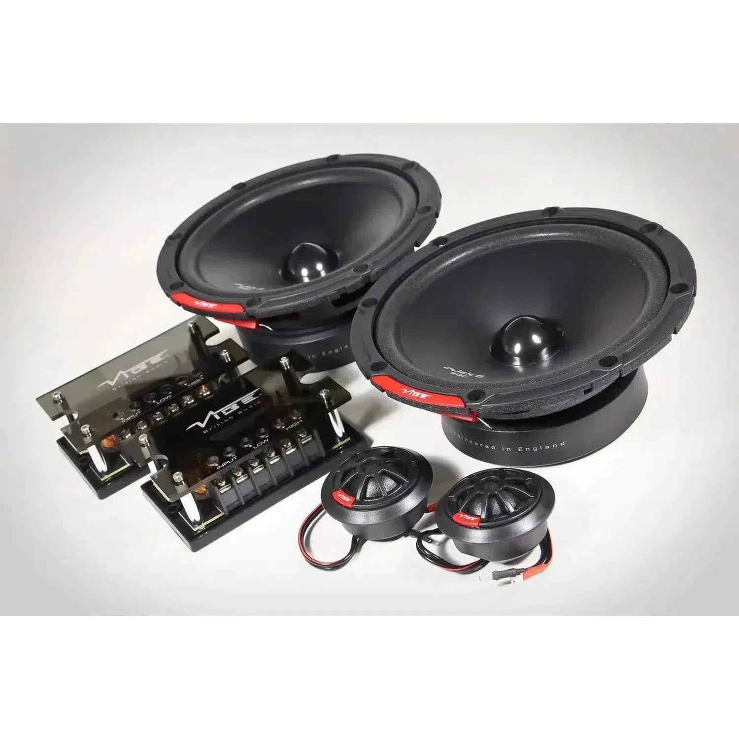 Upgrade your sound with the Vibe Audio Slick 6SQC-V9: a set of two midrange speakers, tweeters, and crossovers on a white background.