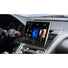 Un gros plan du tableau de bord de la voiture Zenec Z-N1000 montre un grand écran tactile avec Auto Radio, Apple CarPlay sans fil et des options de navigation.